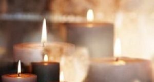 Will anyone take the blame and pay the price for Esidimeni? Burning candles in front of a festive background