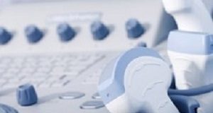 Ultrasound may be superior for treatment of prostate cancer a medical equipment background, close-up ultrasound machine