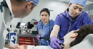 55% of former ICU patients report symptoms of psychological disorders Patient and doctors in the emergency room