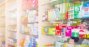 SA pharmacies 'knowingly stock dangerous and ineffective products' Medicines on pharmacy store shelves blurred background