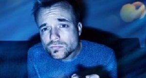 Online gaming addiction in men affects brain's impulse control Man playing video games at night