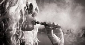 Troublesome issues in e-cigarette policy in America Black and white picture of woman smoking e-cigarette