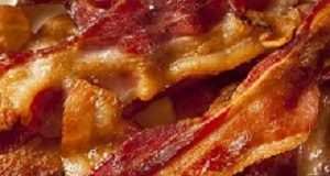 Bacon-cancer link: Outgoing UN agency head defends its work Crispy Organic Unhealthy Bacon on a Background